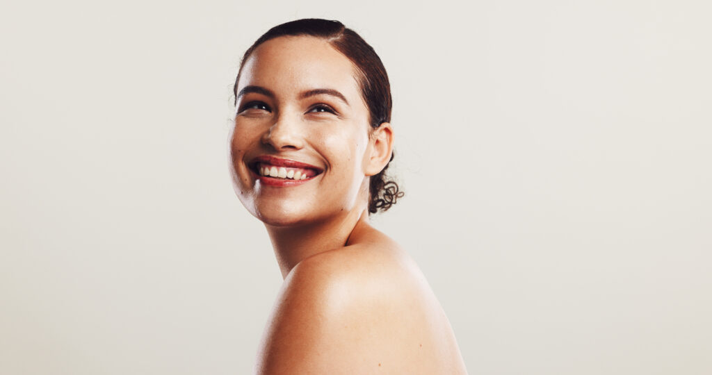 Smiling woman with healthy, glowing skin